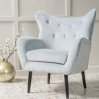 Fauteuil à oreilles de style milieu de siècle – Velours capitonné, pieds en chêne, 34 larg. x 30 prof. x 40 haut. po.