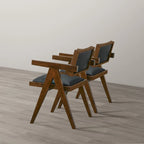 Chaises de salle à manger contemporaines Sandy en similicuir noir (lot de 2)